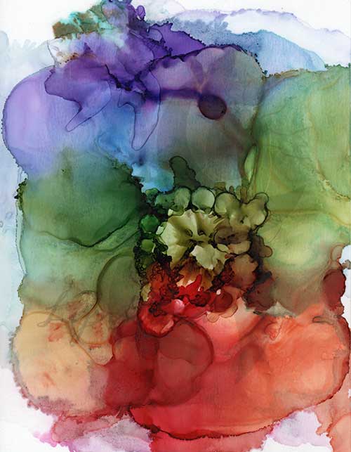 a colorful abstract image with all the rainbow colors radiating out from an apparent explosion in the center.